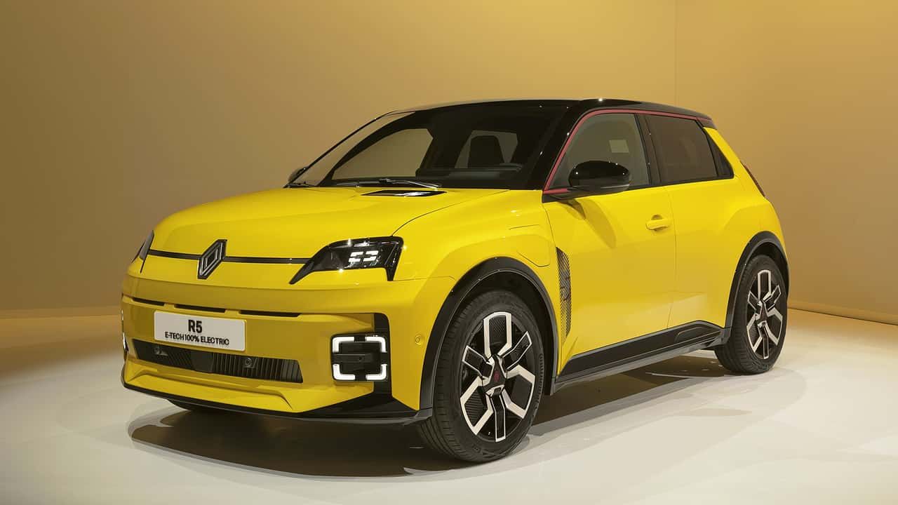 Here is image of Electric car of Renault R5 in yellow colour